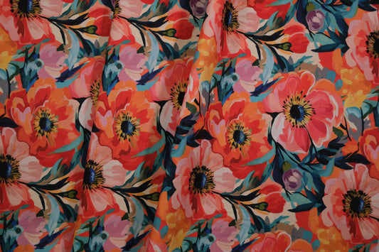 Farbstarker Baumwollstoff mit großflächigen Blumen in Pink und Orange