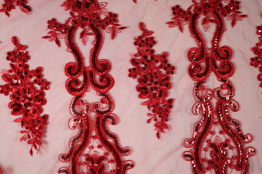 Feine Stickerei in Feuerrot – ideal für festliche Outfits und kreative Projekte