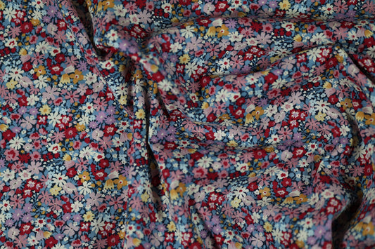 Baumwollstretch – Verspielte Blümchen auf Navy und Rosa – angenehm, flexibel und hochwertig verarbeitet