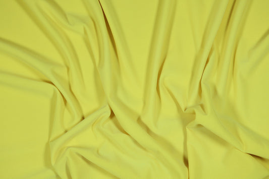 Elastischer Jersey in einem hellen, sonnigen Gelbton fĂŒr Sommerbekleidung