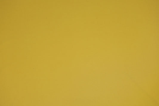 Elastischer Jersey in Senfgelb, zu einer Rosette gedreht, ideal fĂŒr Herbstmode