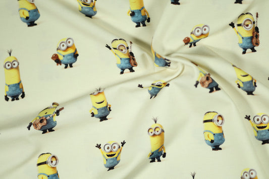 Cremefarbener Stoff mit gelben Minions, ideal für Bettwäsche und Pyjamas