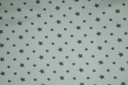 Weicher Kinderstoff mit Sternen – ideal für Jungenkleidung.