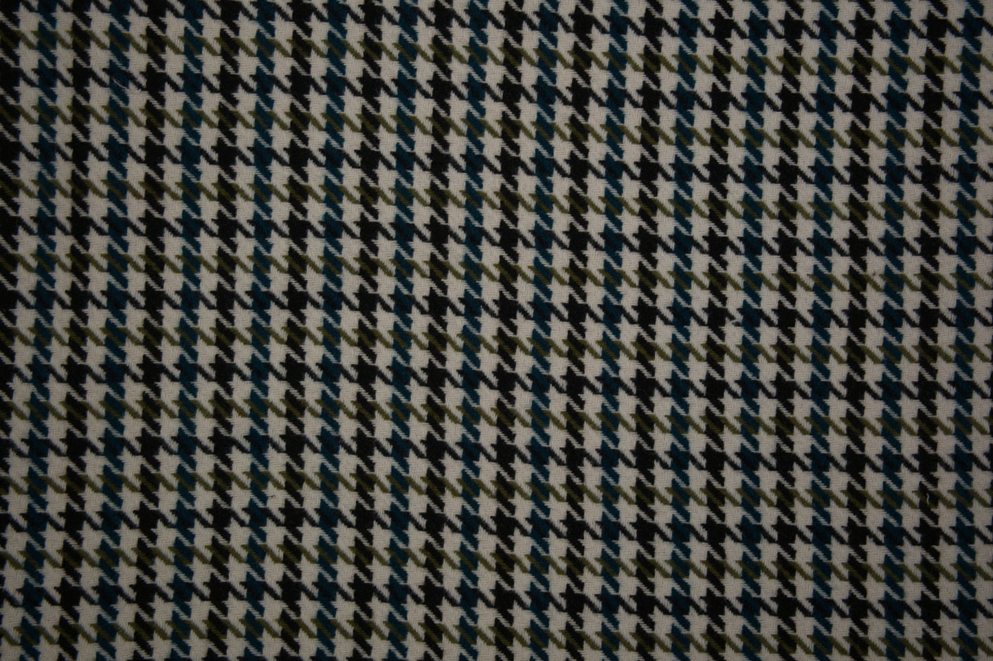 Klassischer Hahnentritt Wollstoff in Grün Schwarz – detailreiche Nahaufnahme