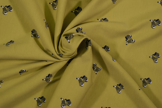 Grüner Baumwolljersey mit kleinen Hundemotiven