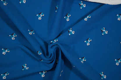 Blauer Baumwolljersey mit kleinen Rollern