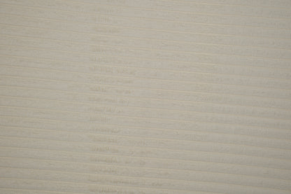 Heller Cord Möbelstoff in Creme – weicher Polsterstoff mit Rippenstruktur Detailaufnahme der Stoffstruktur
