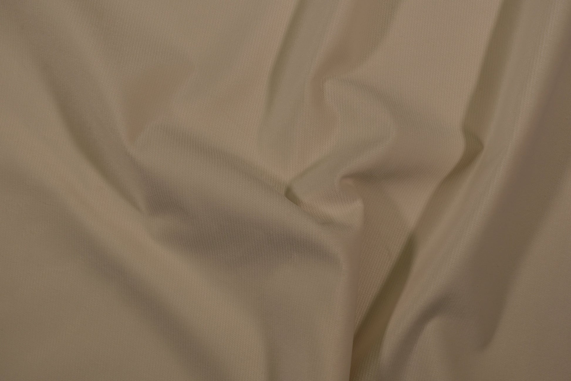 Möbelstoff in Uni-Creme mit glatter, feiner Struktur Detailaufnahme der Stoffstruktur