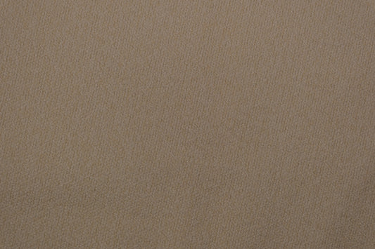 Heller Bouclé Möbelstoff in Creme – strukturierter Polsterstoff für moderne Wohnräume Detailaufnahme der Stoffstruktur