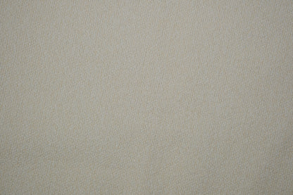 Heller Bouclé Möbelstoff in Creme – strukturierter Polsterstoff für moderne Wohnräume Detailaufnahme der Stoffstruktur
