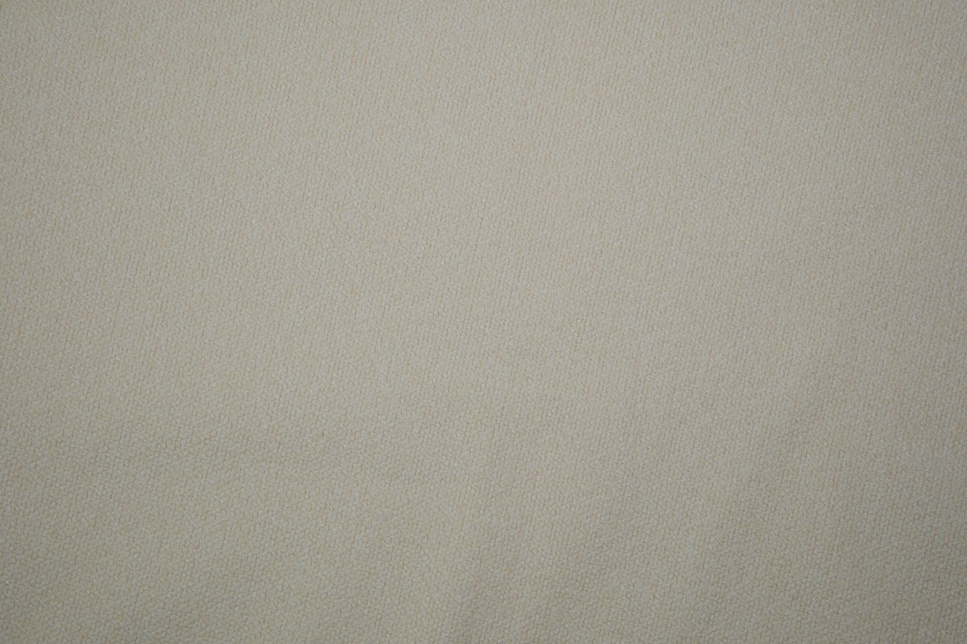 Heller Bouclé Möbelstoff in Creme – strukturierter Polsterstoff für moderne Wohnräume Detailaufnahme der Stoffstruktur