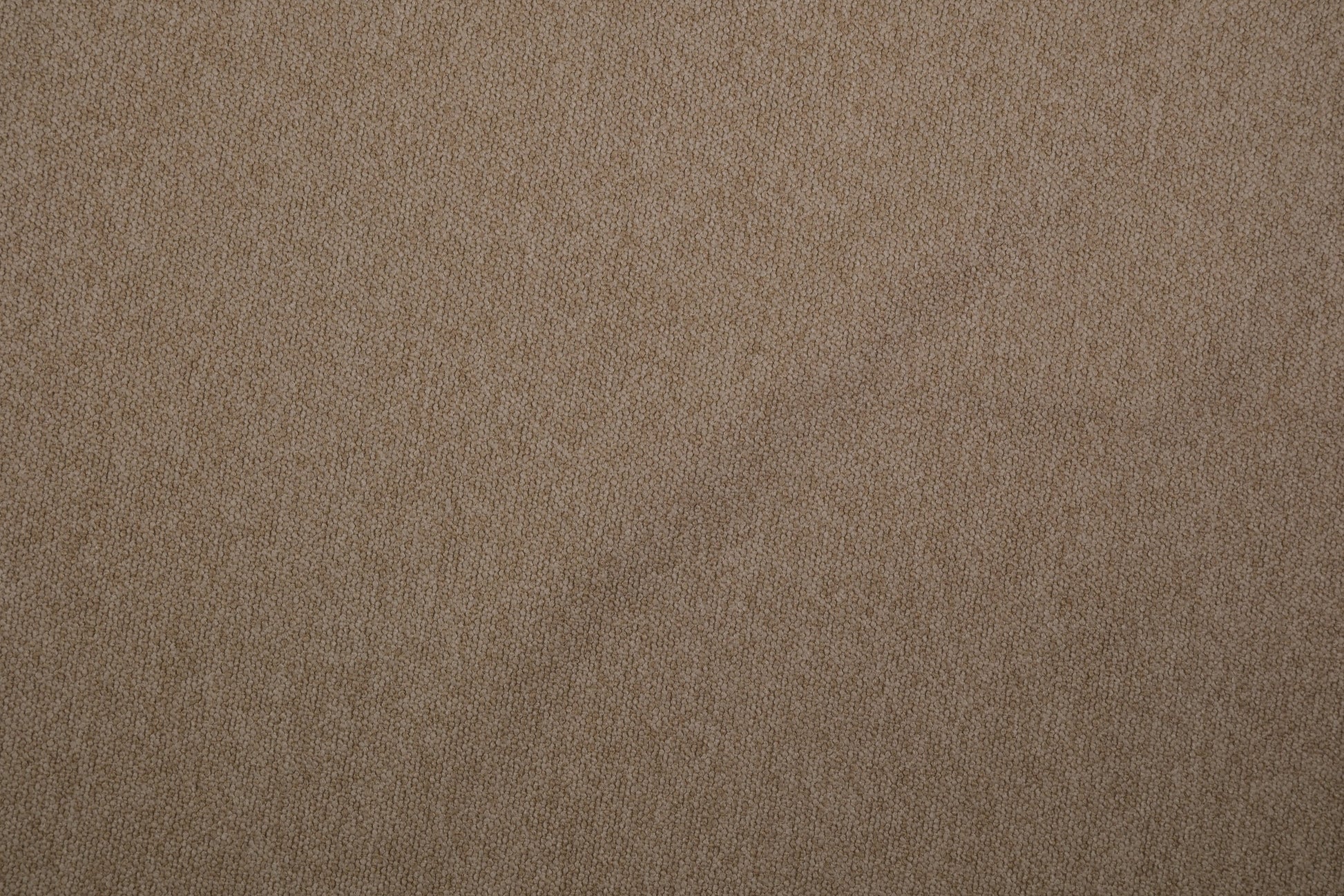 Möbelstoff Bouclé in Sandbeige als Polsterstoff für Sofa und Sessel Detailaufnahme der Stoffstruktur