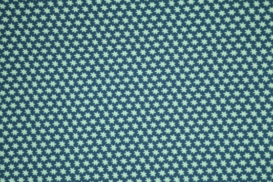 Kleine Blüten auf Marineblau – hochwertiger Baumwollstoff für Kinder und kreative Projekte.