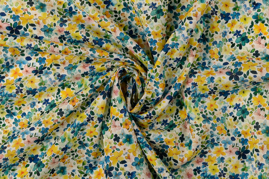 Baumwoll Voile Stoff mit buntem Blumenmuster auf hellem Hintergrund leicht und luftig