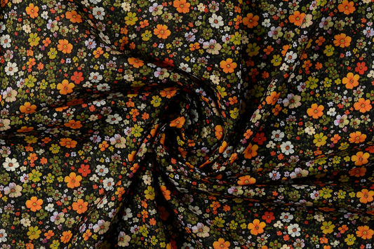 Baumwoll Voile Stoff mit buntem Blumenmuster auf dunklem Hintergrund leicht und luftig