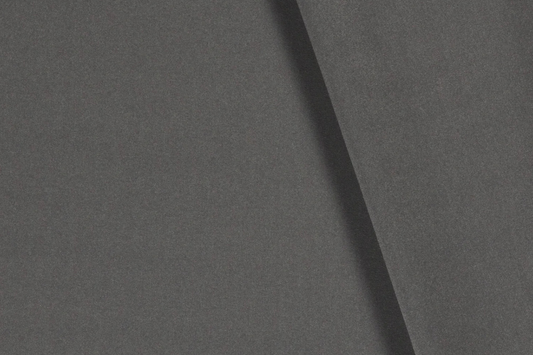 Dunkelgrauer Uni Stoff aus Polyester mit matter Oberfläche Stoffeya