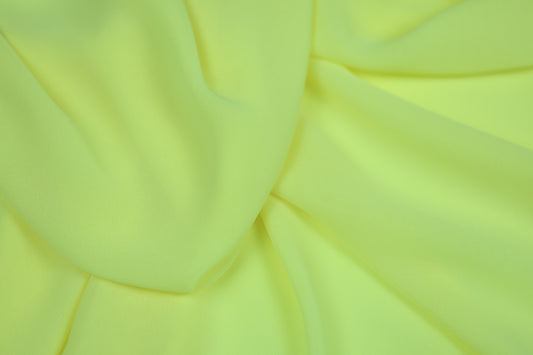 Neongelber Chiffonstoff mit fließendem Fall – perfekt für auffällige Designs